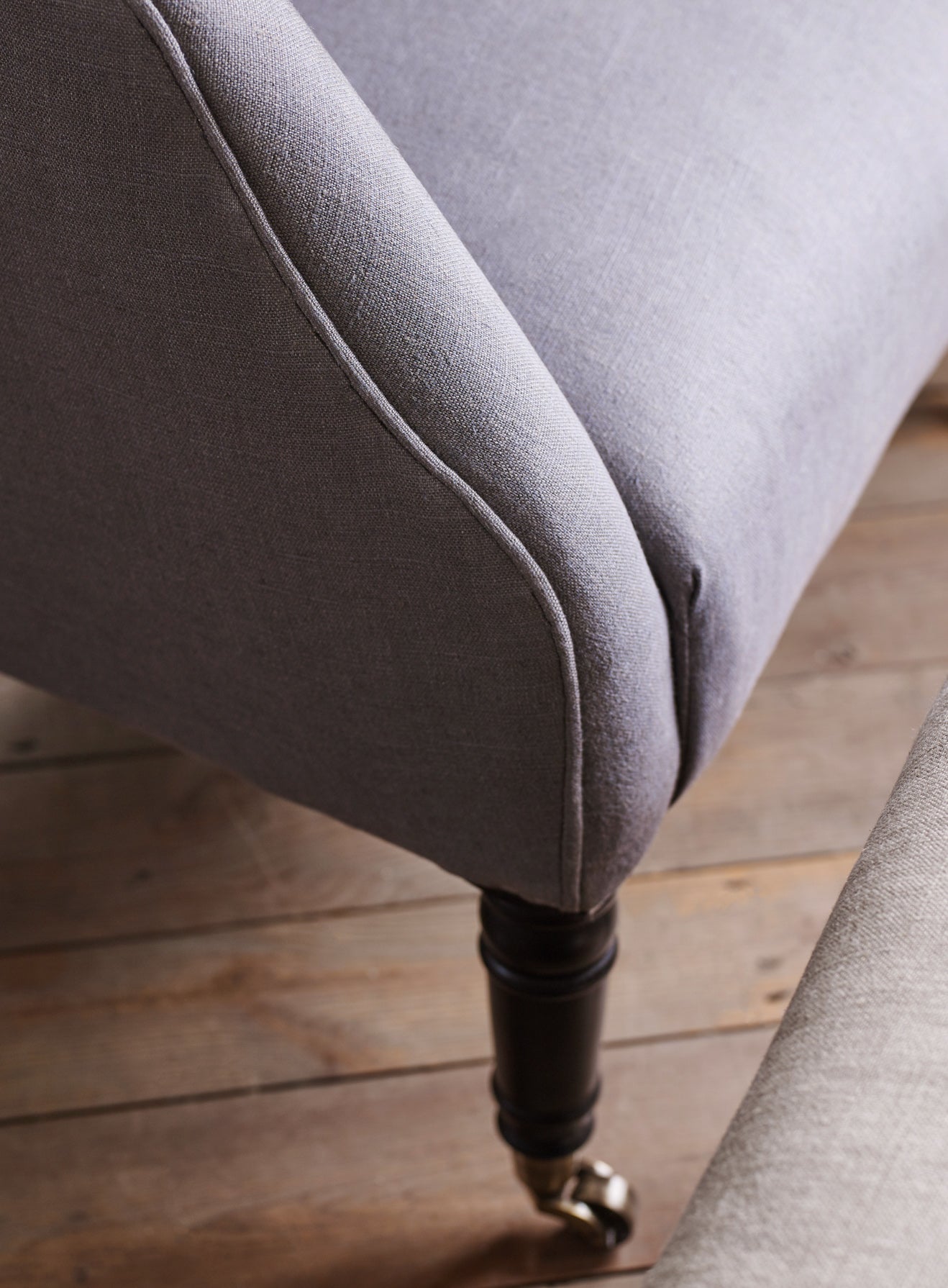 Fauteuil à oreilles Bromley, lin gris (pieds noirs)
