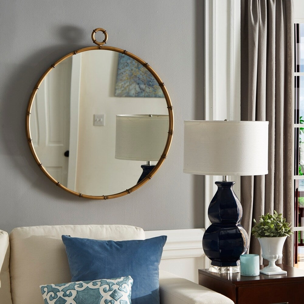 Marza Miroir mural rond avec finition laiton antique par iNSPIRE Q Modern