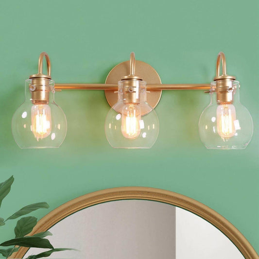 Applique murale moderne dorée à 3 lumières pour salle de bain, avec abat-jour sphérique en verre.