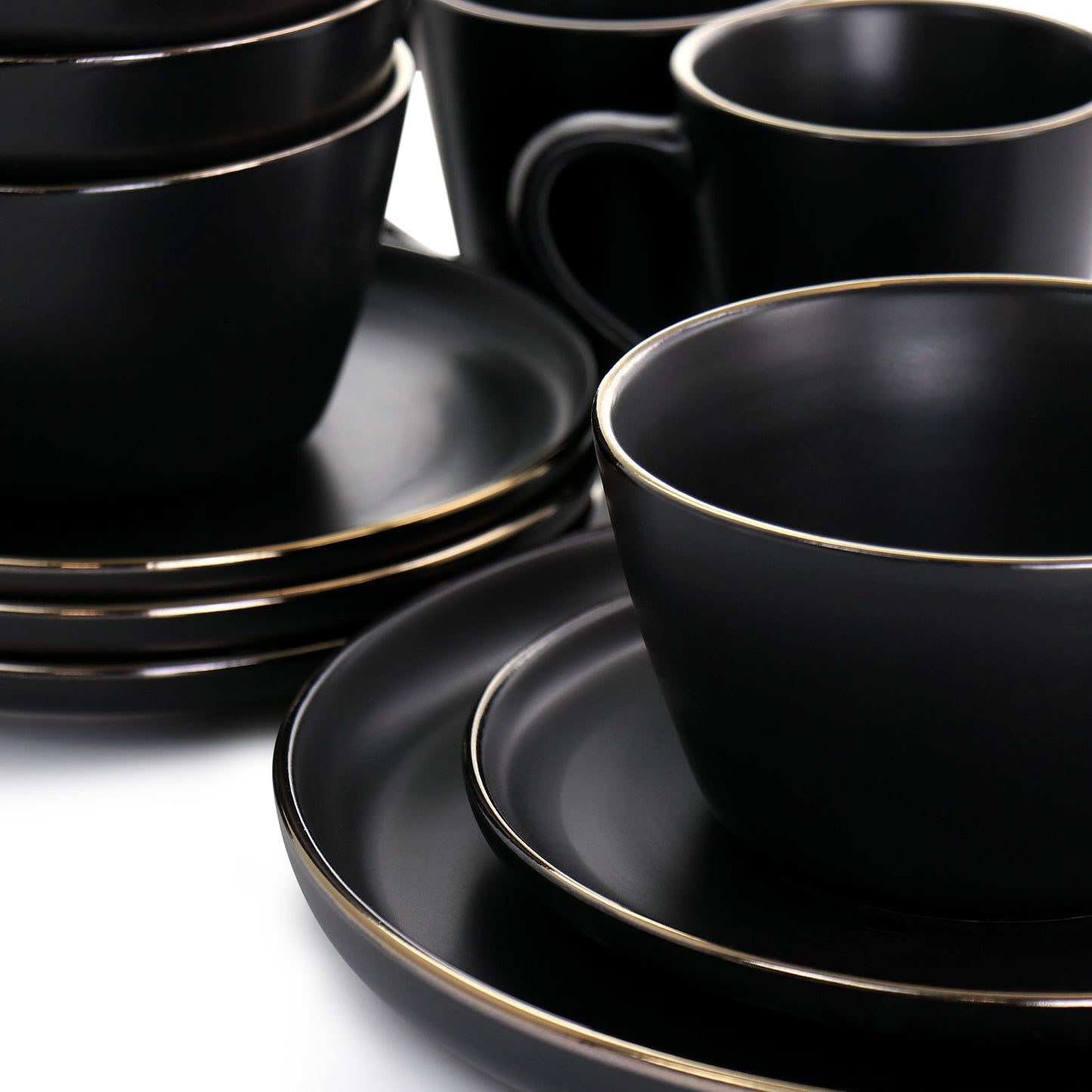 Service de table en grès 16 pièces noir avec bord doré