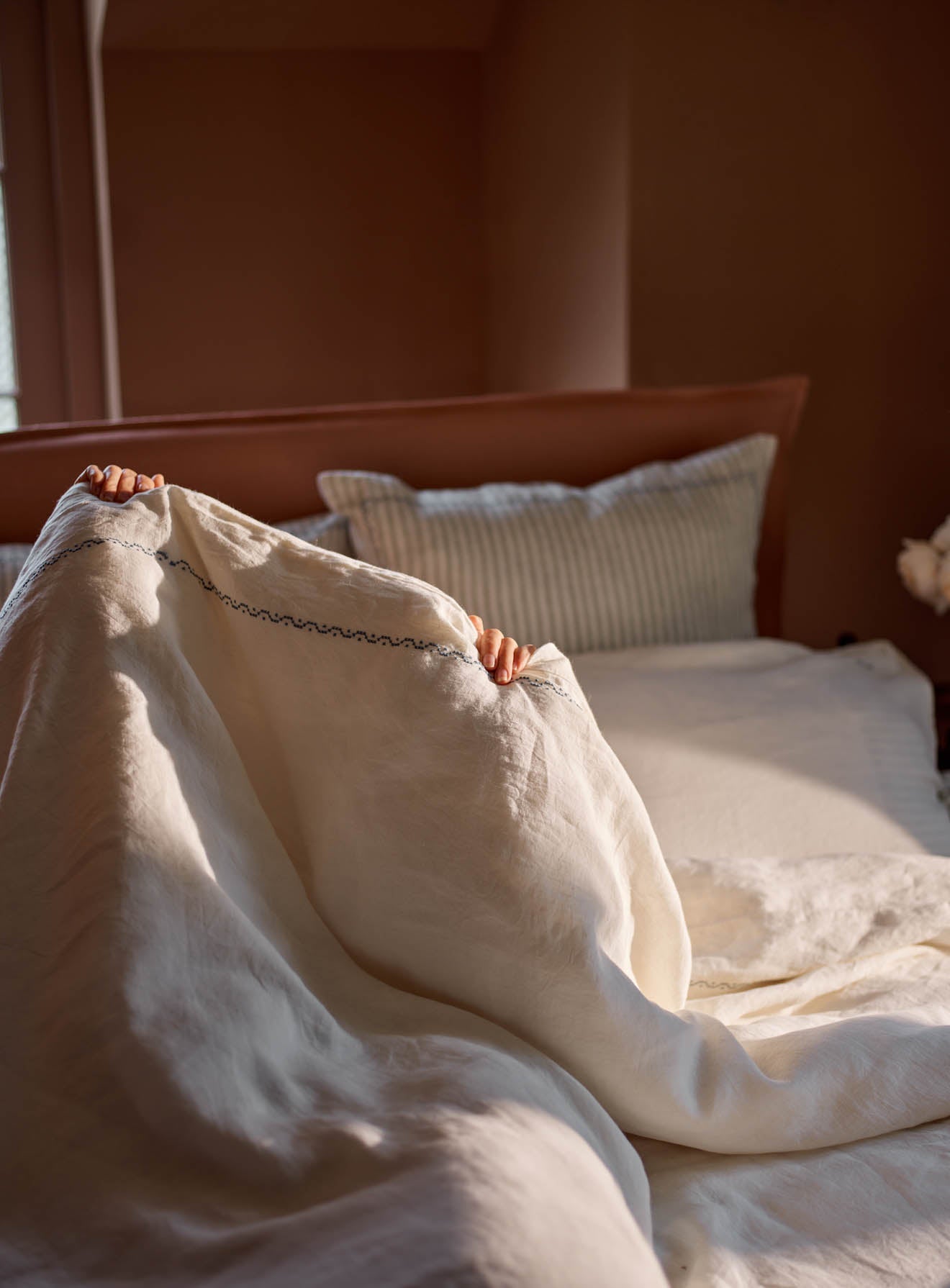 Couette en lin brodé