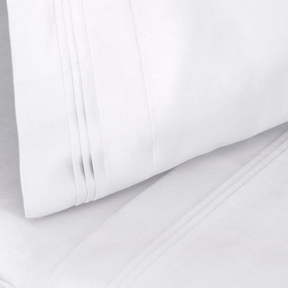 Jeu de draps uni en coton égyptien supérieur, 1000 fils, avec profonde poche.