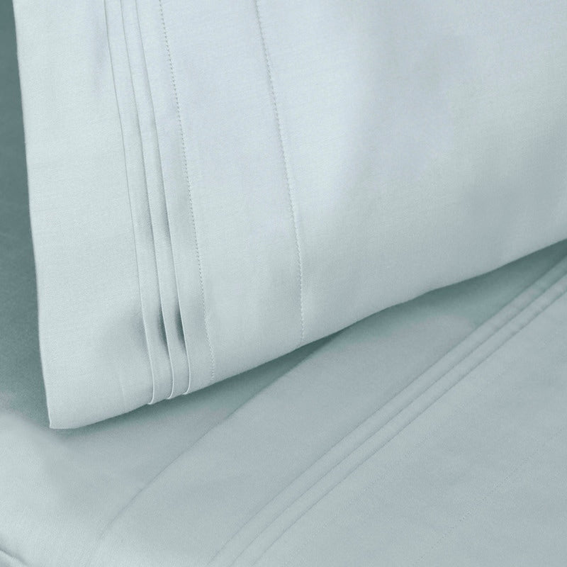 Jeu de draps uni en coton égyptien supérieur, 1000 fils, avec profonde poche.