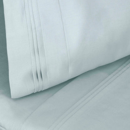 Jeu de draps uni en coton égyptien supérieur, 1000 fils, avec profonde poche.