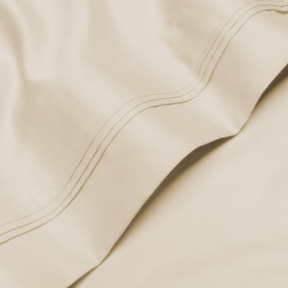 Jeu de draps uni en coton égyptien supérieur, 1000 fils, avec profonde poche.