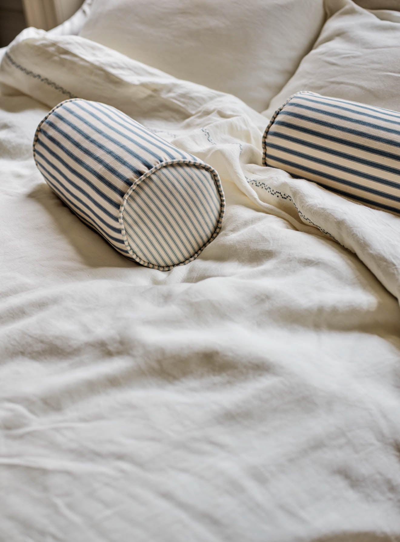 Coussin traversin, rayures bleues