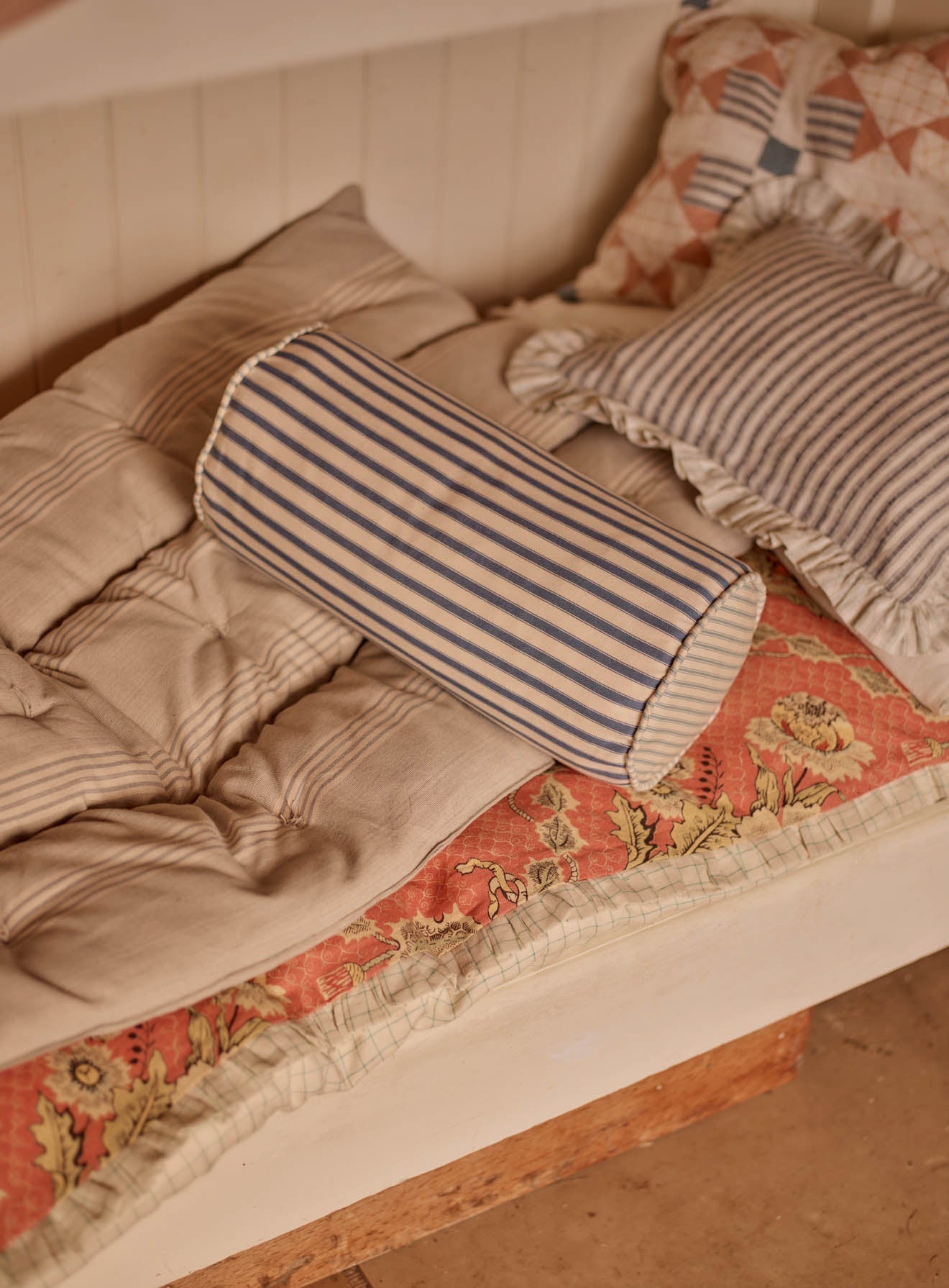 Coussin traversin, rayures bleues