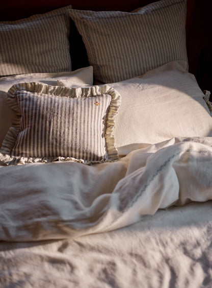 Coussin en lin à rayures