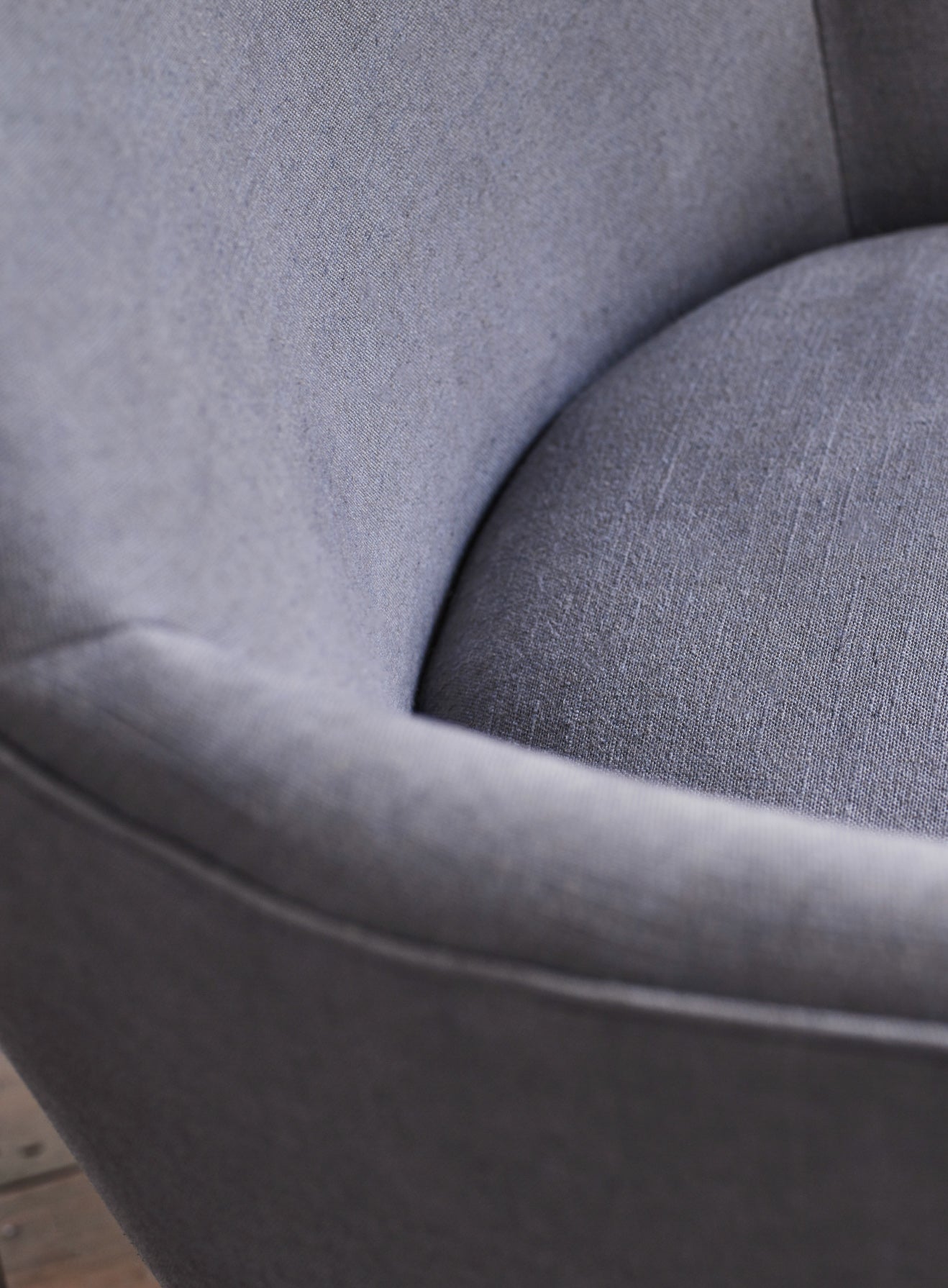 Fauteuil à oreilles Bromley, lin gris (pieds noirs)