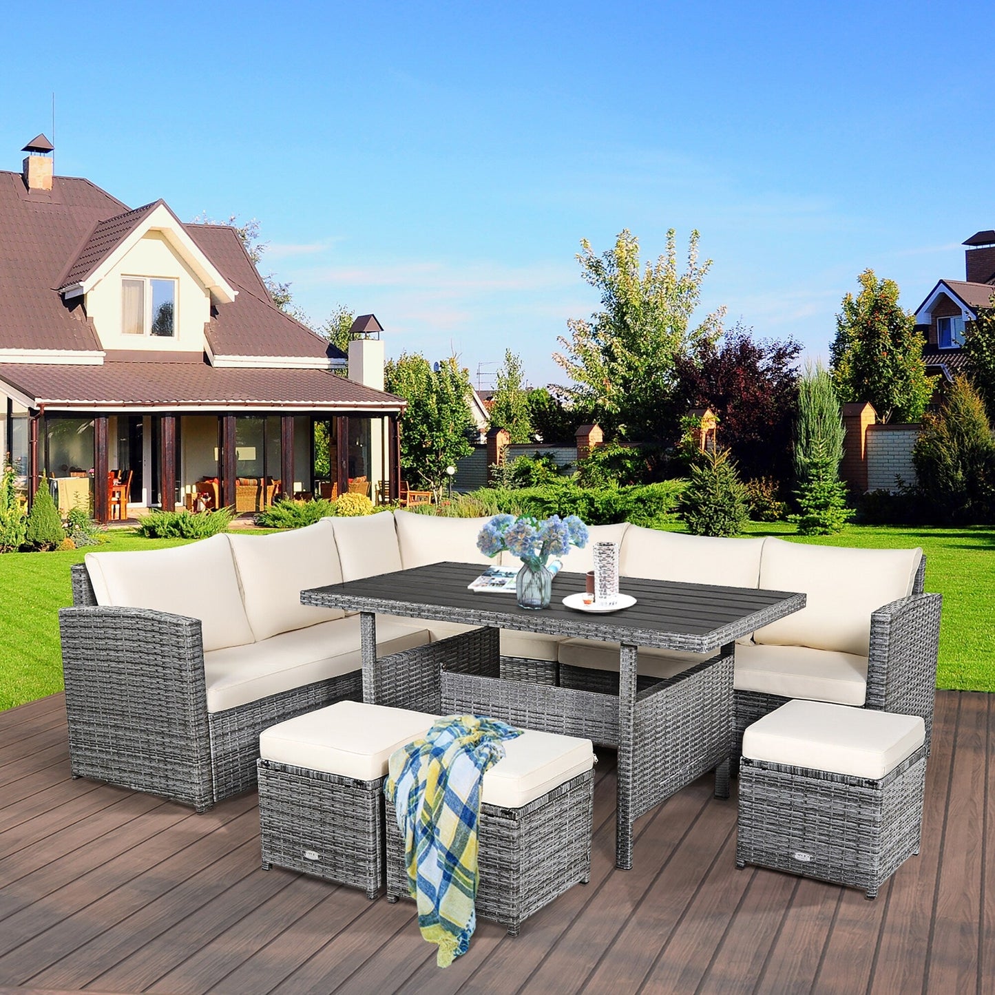 Costway Ensemble de salon en rotin pour patio, 7 pièces, avec canapé d'angle, pouf et ottoman - Voir les détails