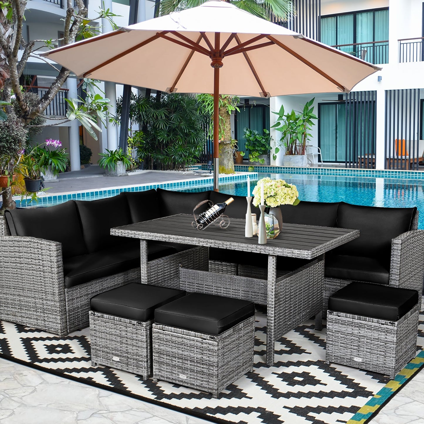 Costway Ensemble de salon en rotin pour patio, 7 pièces, avec canapé d'angle, pouf et ottoman - Voir les détails