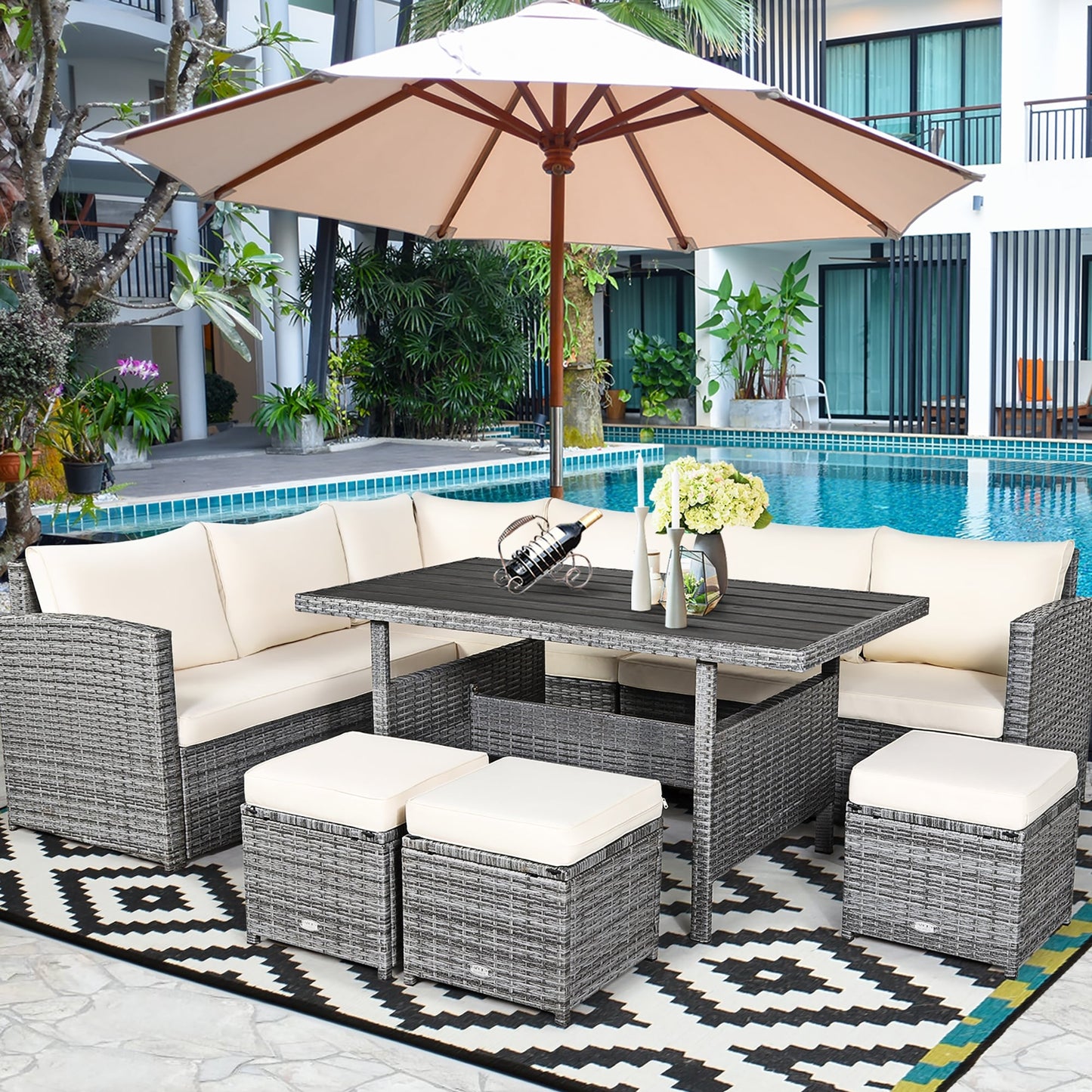 Costway Ensemble de salon en rotin pour patio, 7 pièces, avec canapé d'angle, pouf et ottoman - Voir les détails