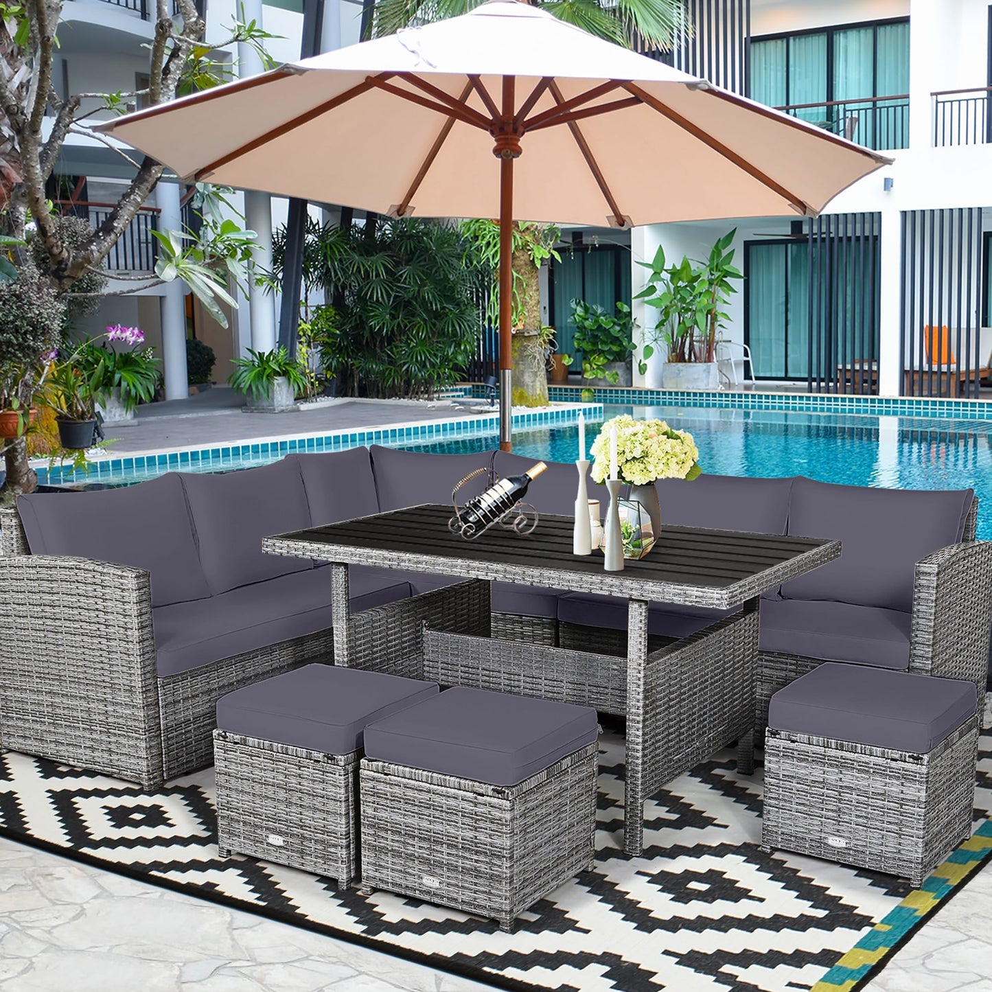 Costway Ensemble de salon en rotin pour patio, 7 pièces, avec canapé d'angle, pouf et ottoman - Voir les détails