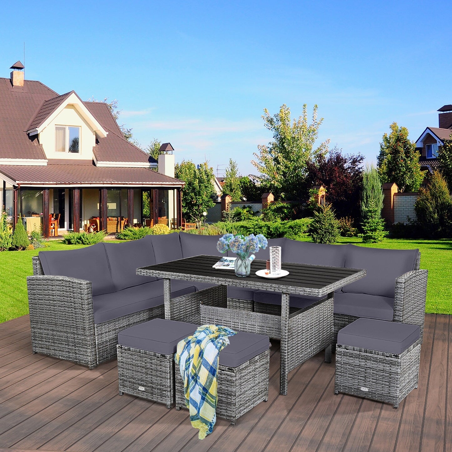 Costway Ensemble de salon en rotin pour patio, 7 pièces, avec canapé d'angle, pouf et ottoman - Voir les détails