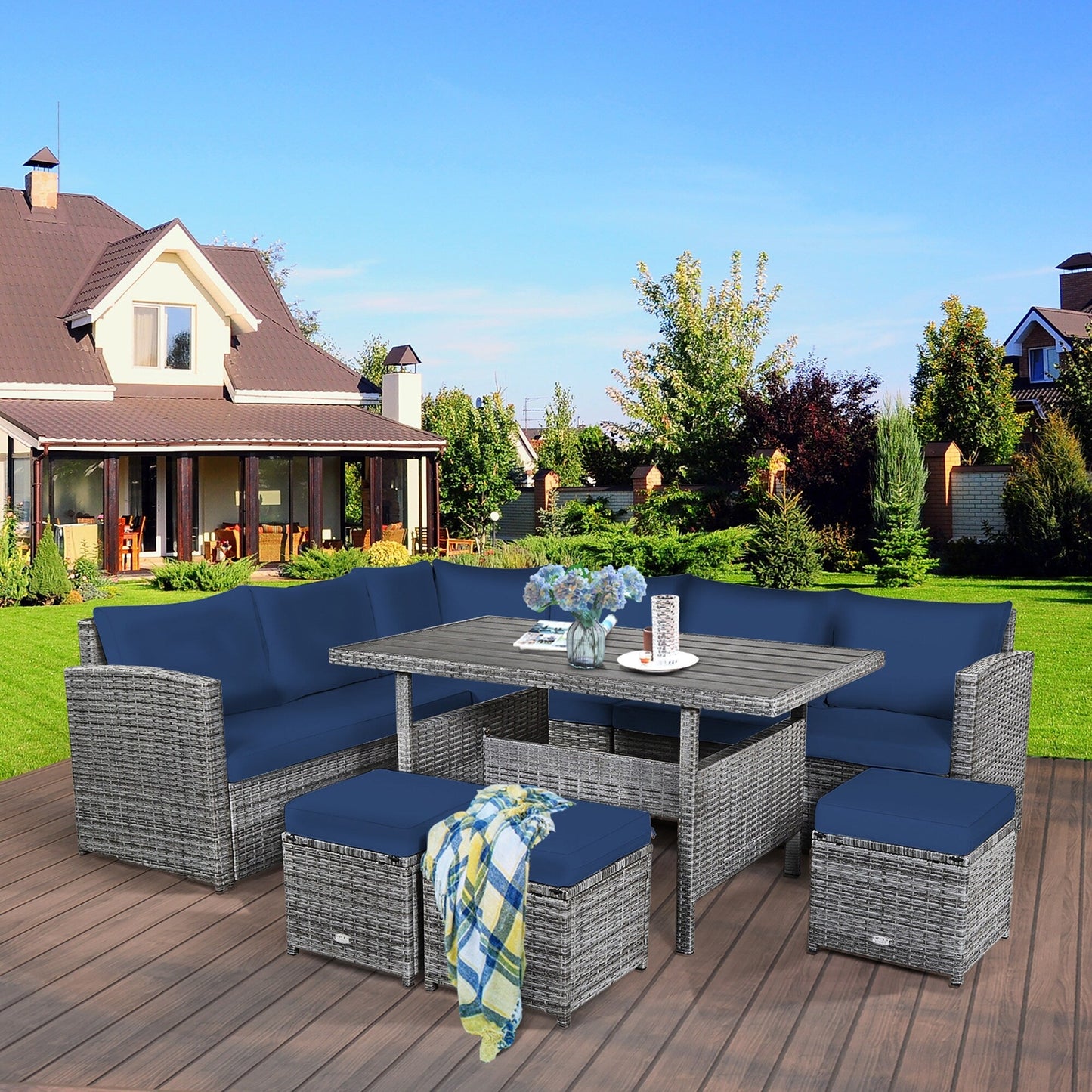 Costway Ensemble de salon en rotin pour patio, 7 pièces, avec canapé d'angle, pouf et ottoman - Voir les détails