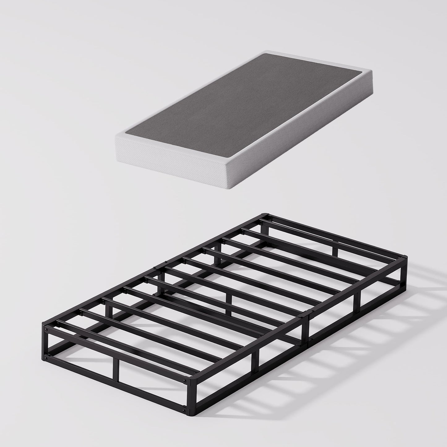 Ressort métallique à profil bas de 5 pouces, structure robuste avec revêtement gris.