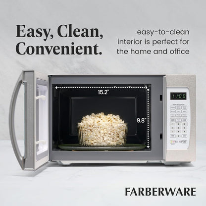Four à micro-ondes Farberware Professional de 1,3 pi³ et de 1100 watts avec fonction de cuisson intelligente à capteur, blanc et platine