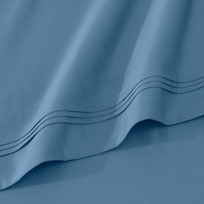 Jeu de draps uni en coton égyptien supérieur, 1000 fils, avec poche profonde.