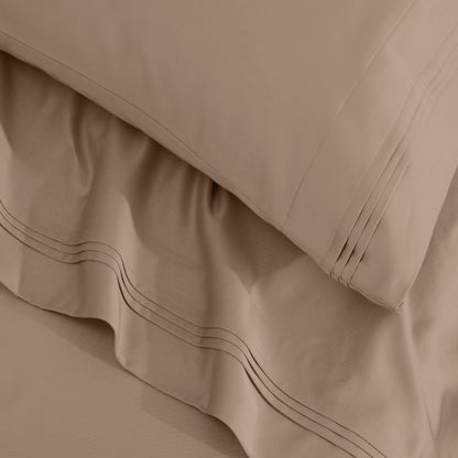 Jeu de draps uni en coton égyptien supérieur, 1500 fils, avec poche profonde.
