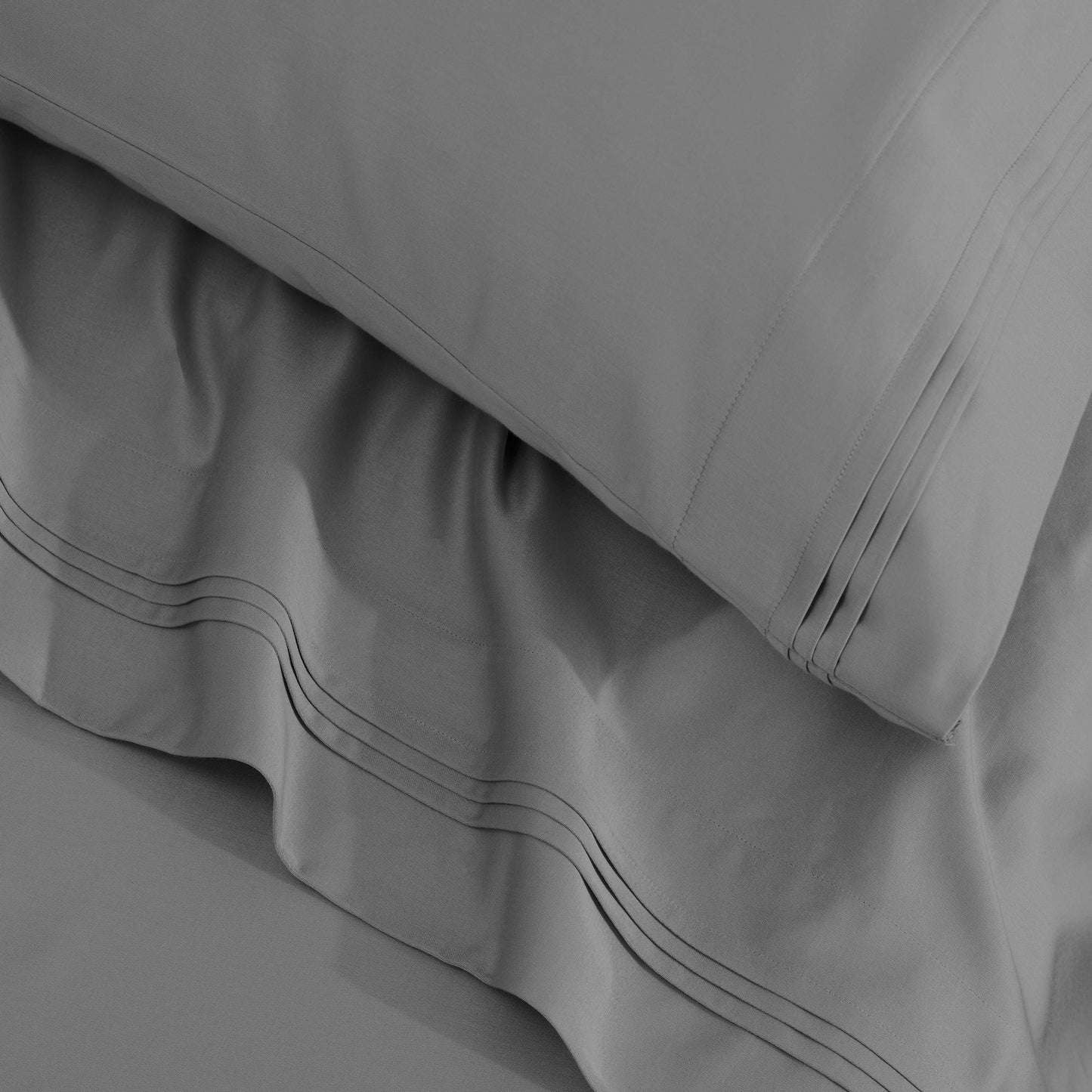 Jeu de draps uni en coton égyptien supérieur, 1500 fils, avec poche profonde.